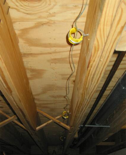Cable hangers instead of drilling through joists