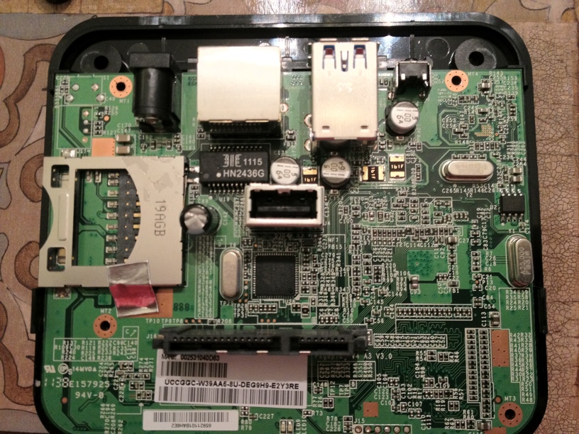 Exposed main board shows the USM, USB 2.0 and SD card slot.
