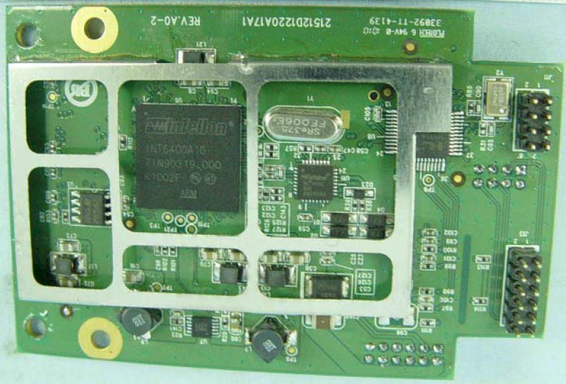 Closeup of the powerline board showing Qualcomm/Atheros INT6400 / INT1400 third generation HomePlug AV chipset
