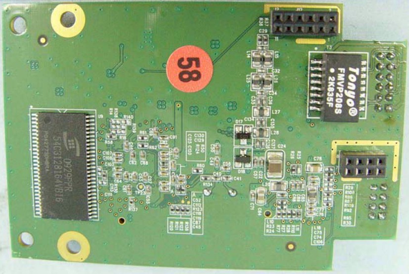 Bottom side of powerline board showing 16 MB RAM chip