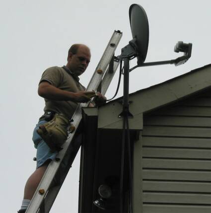 Bill from B&M installs the 18x24 triple LBN DirecTV satellite dish