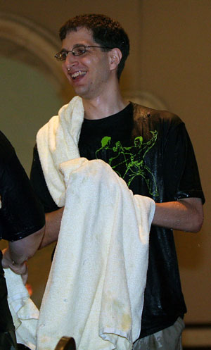 Jeff Moss, organizer of DEFCON, after being dunked with water during the closing ceremonies