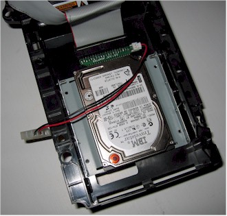 2.5" replacement drive mounted in the Xbox HDD tray